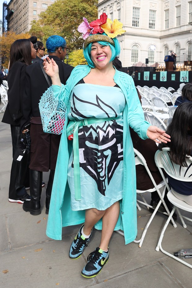 NEW YORK, NEW YORK - OCTOBER 24: A New York Liberty fan poses during the Championship ticker tape parade and victory rally celebrating winning the 2024 WNBA Finals at City Hall on October 24, 2024 in New York City. NOTE TO USER: User expressly acknowledges and agrees that, by downloading and/or using this photograph, user is consenting to the terms and conditions of the Getty Images License Agreement. (Photo by Elsa/Getty Images)