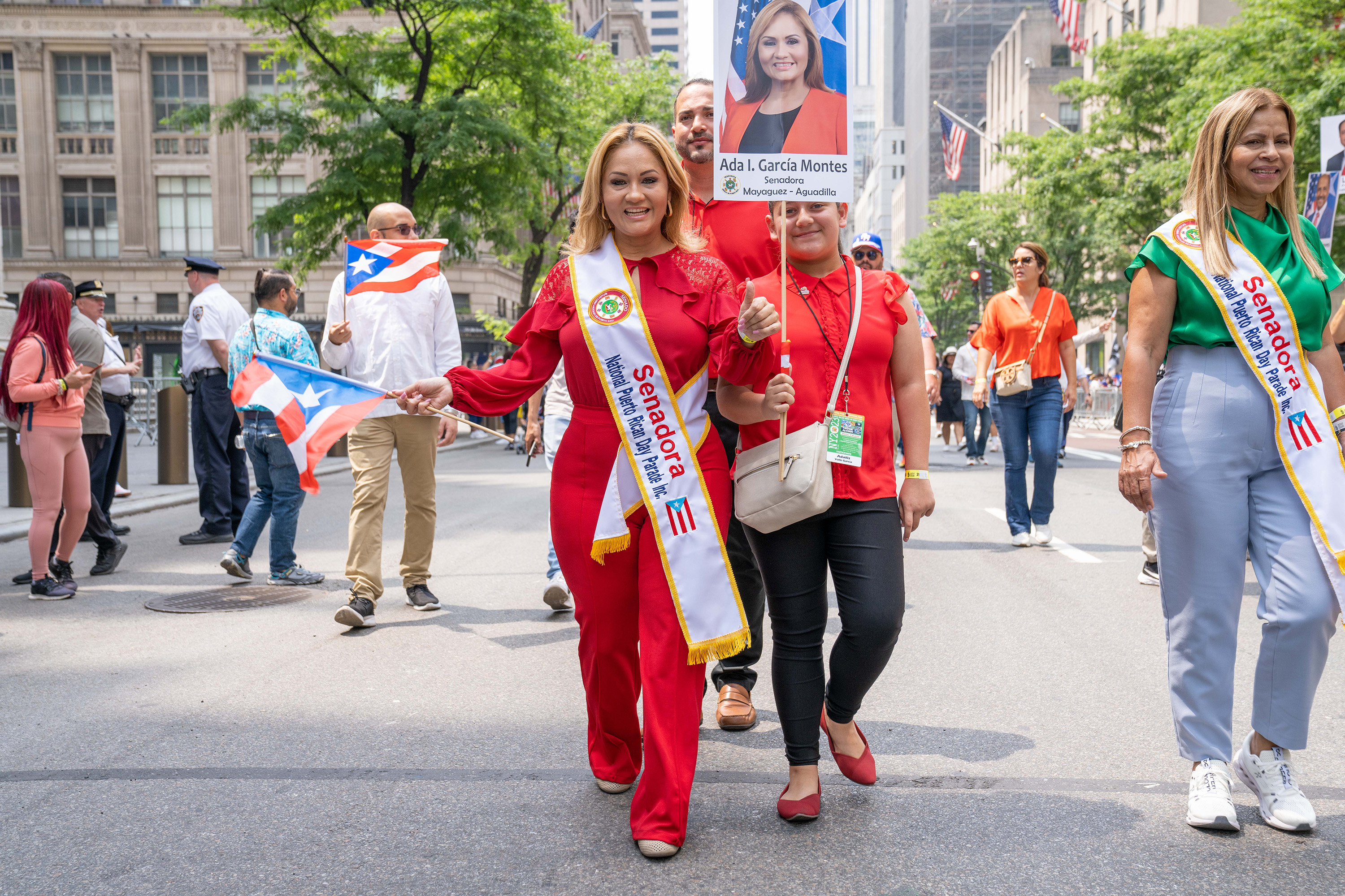 Participants pose for a photo during the Puerto Rican Day Parade along 5th Avenue in Manhattan on Sunday, June 11, 2023.
