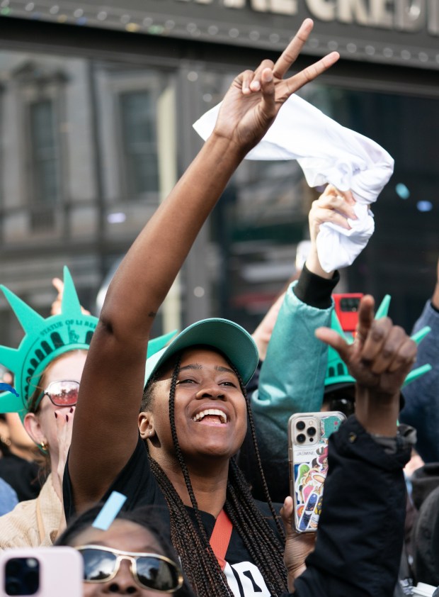 Fans and New York Liberty players celebrate during a ticker-tape parade in Manhattan's 'Canyon of Heroes' the following the Liberty's WNBA Championship win on Thursday, Oct. 22, 2024, in New York City. (Barry Williams for New York Daily News)