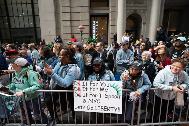 Fans and New York Liberty players celebrate during a ticker-tape parade in Manhattan's 'Canyon of Heroes' the following the Liberty's WNBA Championship win on Thursday, Oct. 22, 2024, in New York City. (Barry Williams for New York Daily News)