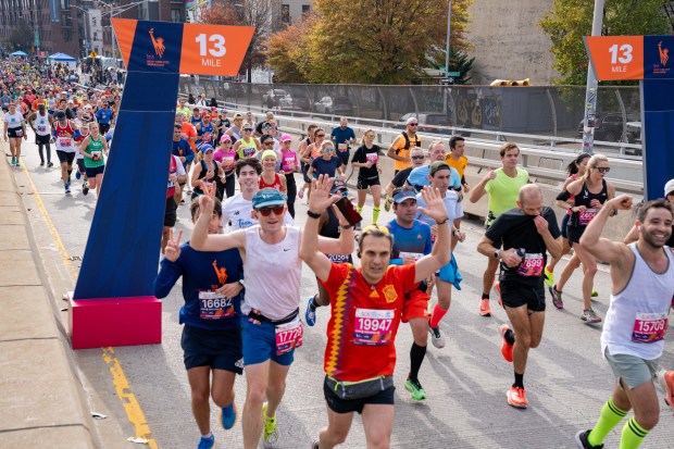 Views of the New York City TCS Marathon as participants make their way across the Pulaski Bridge in Brooklyn on Sunday November 5, 2023. 1129. (Theodore Parisienne for New York Daily News)