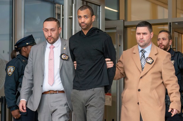 Suspect Waldo Mejia is being taken from the NYPD 40th Precinct in Bronx on Saturday Jan. 11, 2025. (Theodore Parisienne / New York Daily News)