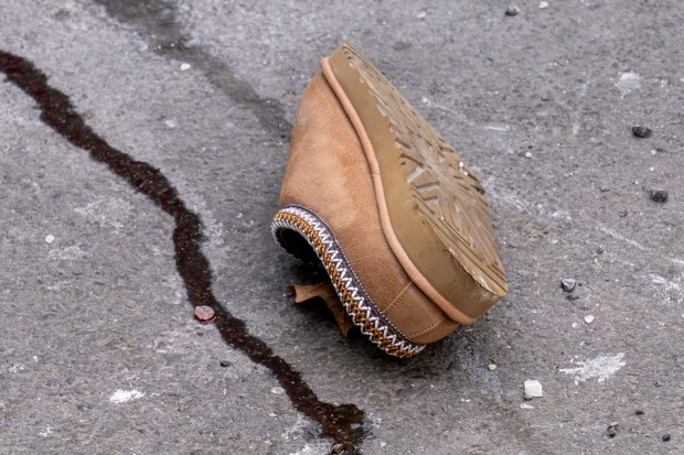 A 14-year-old boy was pronounced dead at Lincoln Hospital after he was found with two stab wounds to his chest behind NYCHA's Mitchel Houses on E. 138th St. near Alexander Ave. in the Bronx on Friday. (Theodore Parisienne / New York Daily News)