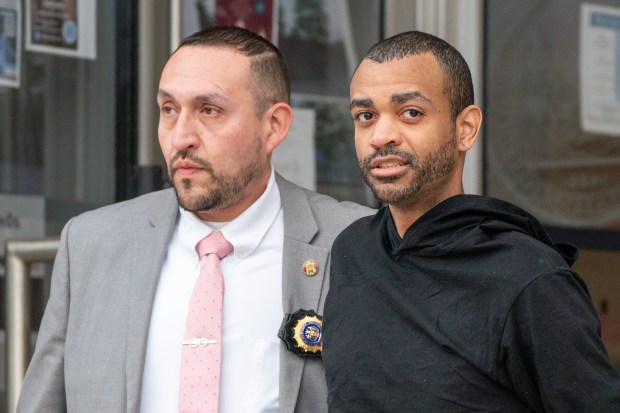 Waldo Mejia, the suspect in the unprovoked stabbing death of Caleb Rijos, 14, is pictured in police custody leaving the NYPD's 40th Precinct stationhouse in the Bronx on Saturday, Jan. 11, 2025. (Theodore Parisienne / New York Daily News)