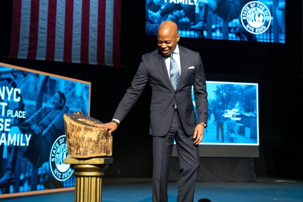 Mayor Eric Adams touches the stump before delivering the state of the city address at the Apollo Theatre Thursday, Jan. 9, 2025 in Manhattan, New York. (Barry Williams/ New York Daily News)